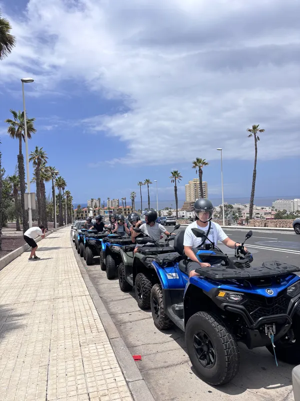 Portrait photo of rider sitting on a premium quad bike in Tenerife
