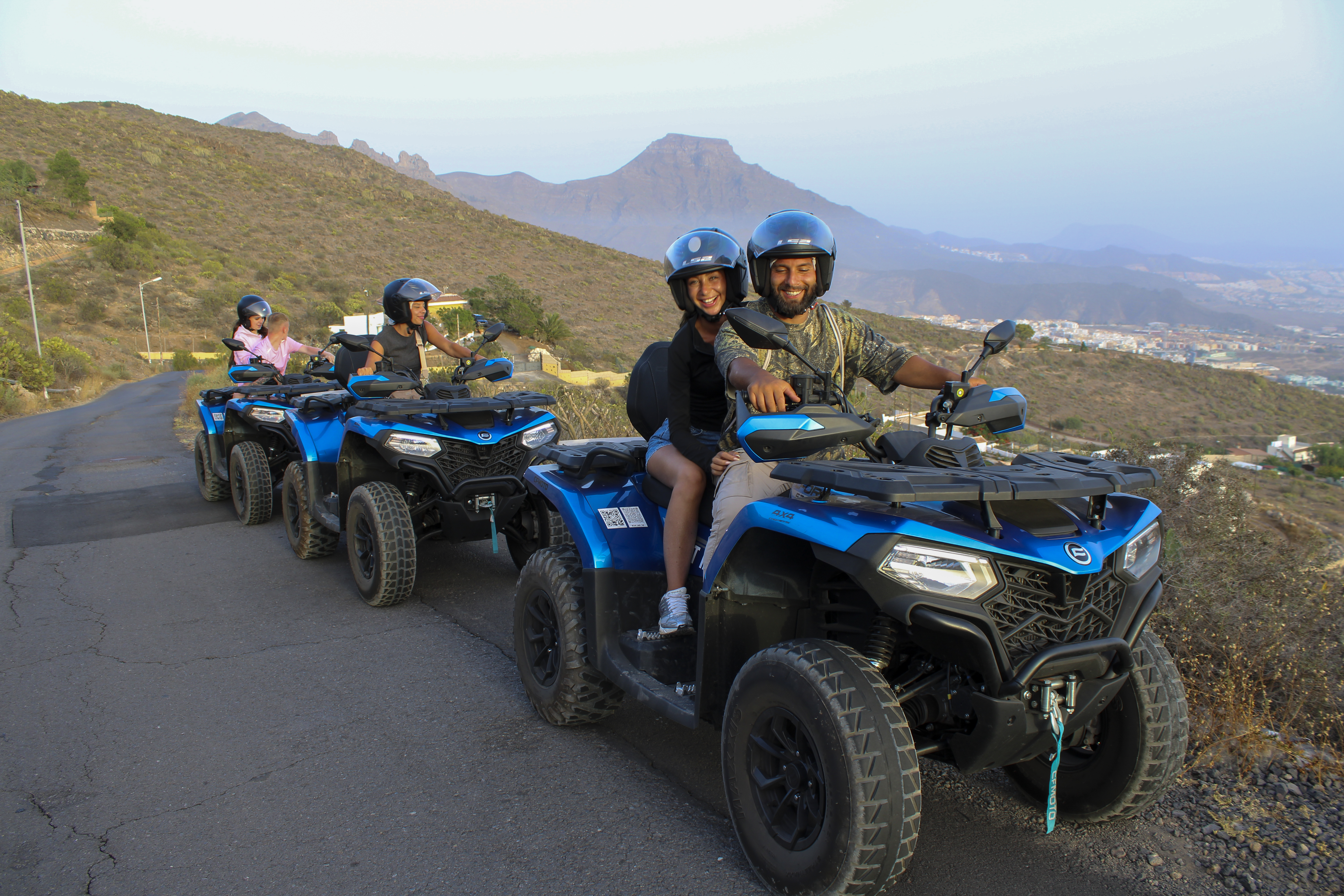 Riders on 550cc XL quad bikes stopping for a photo session in Tenerife